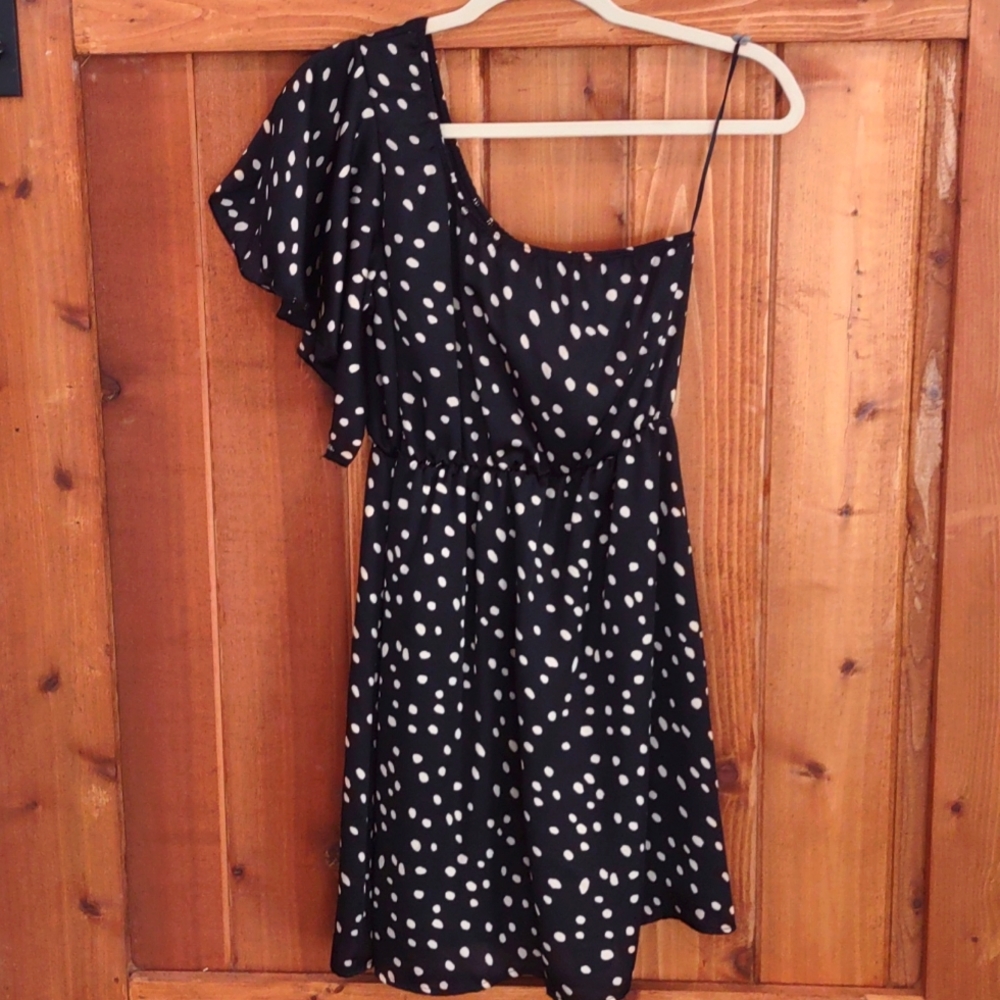 Black dress with gold spots, one shoulder, knee length dress